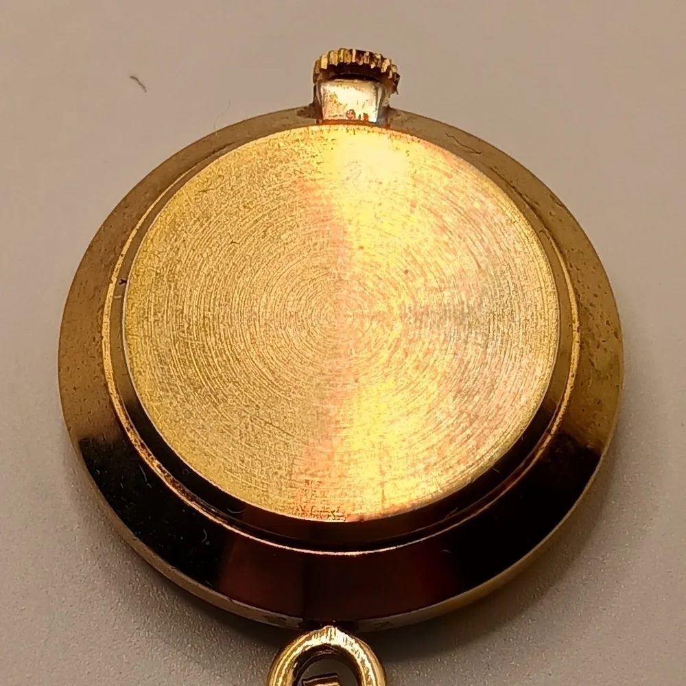 Caravelle Gold Toned Pendant Wind Up Watch